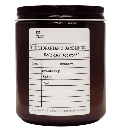 Candle jar with a label from The Librarian's Candle Co. on a white background